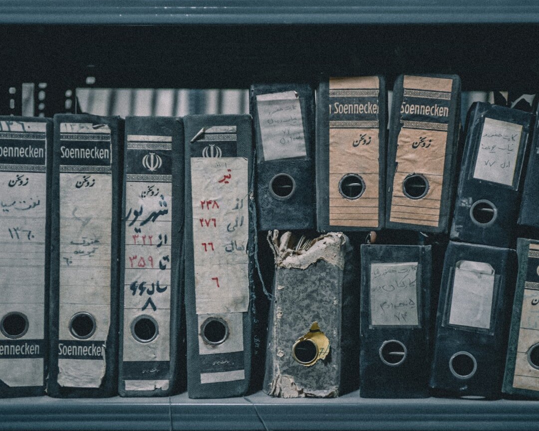 Archive shelves with old advertising reels and posters